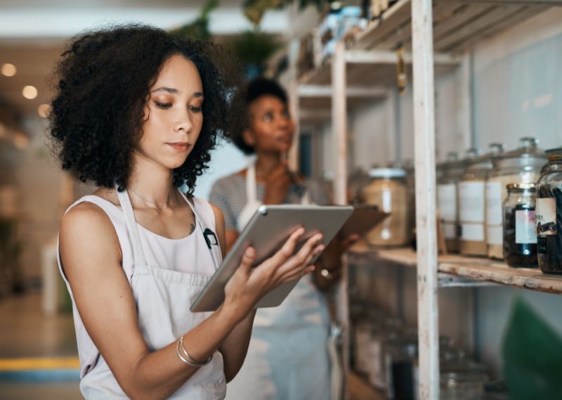Woman using a tablet in a modern workspace